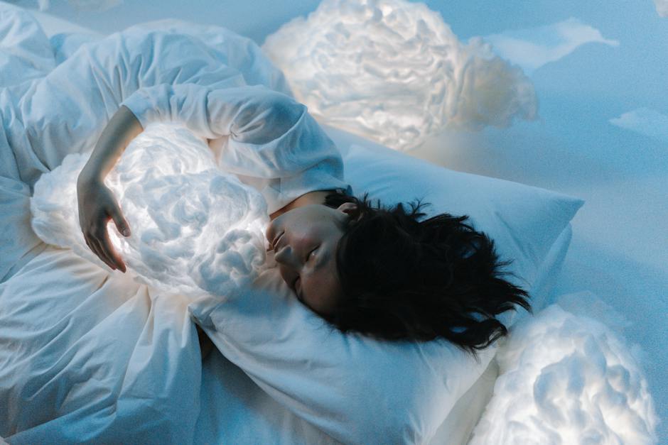 An image showing a person sleeping and having various symbolic dreams.